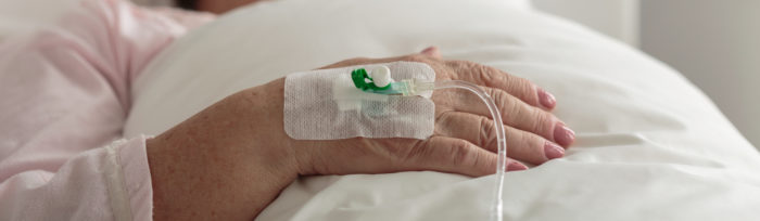 Close-up of female hand with venous catheter