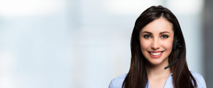 Smiling customer representative portrait, lots of copy-space